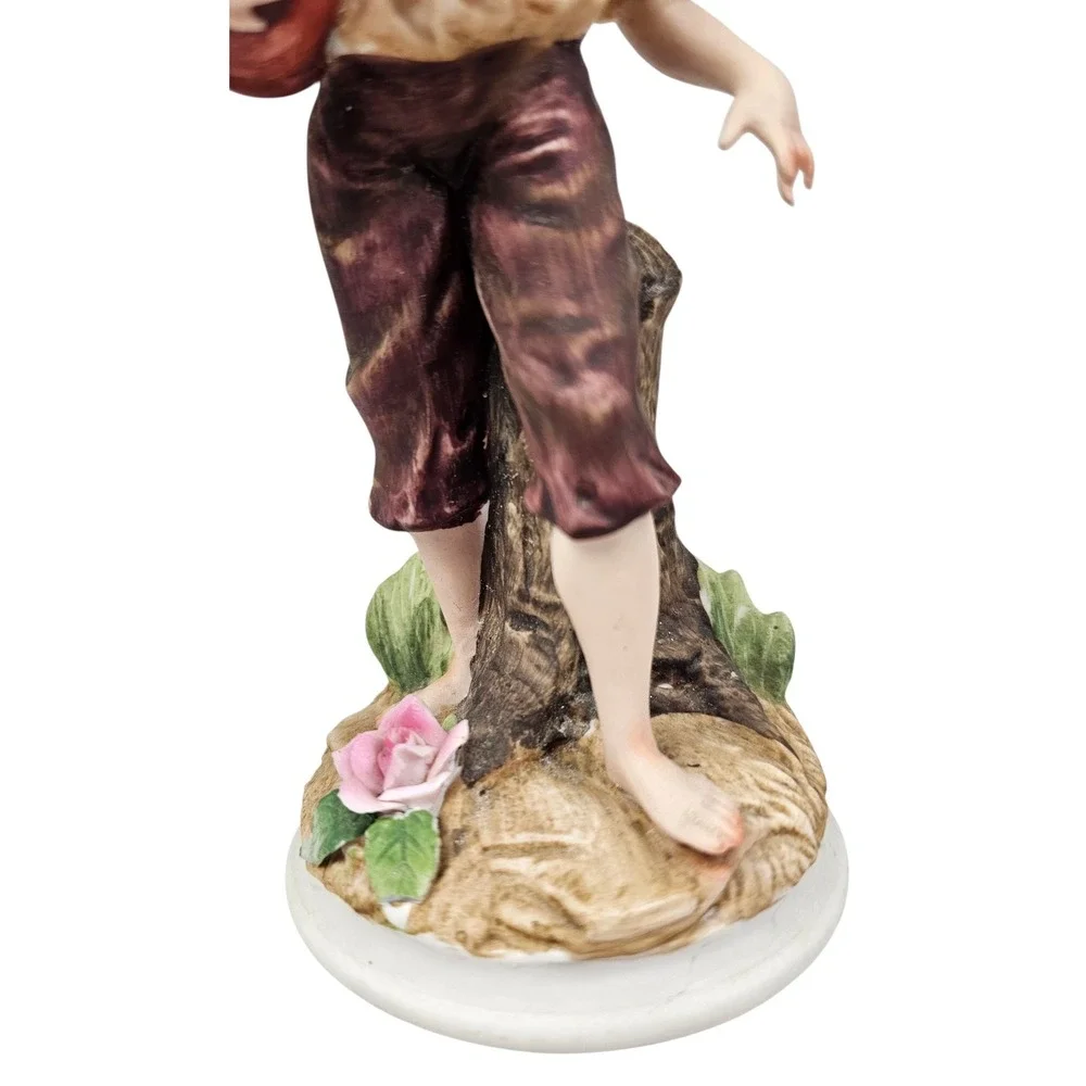 Andrea by Sadek Vintage Porcelain Boy Figurine with‎ Water Jug and Feather Hat